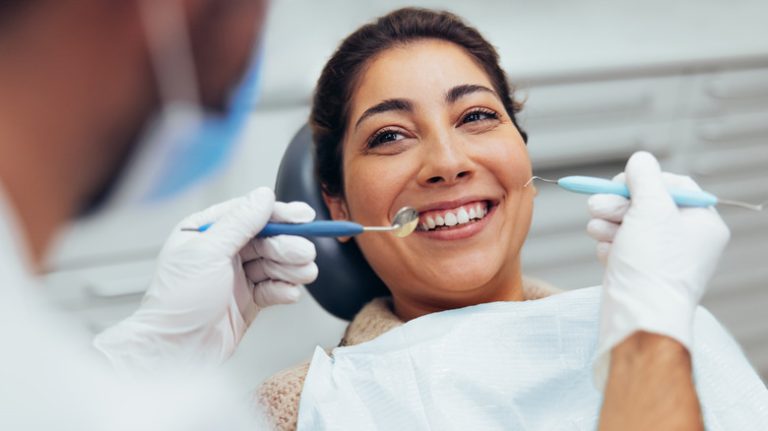 patient having a routine check-up at the dentist