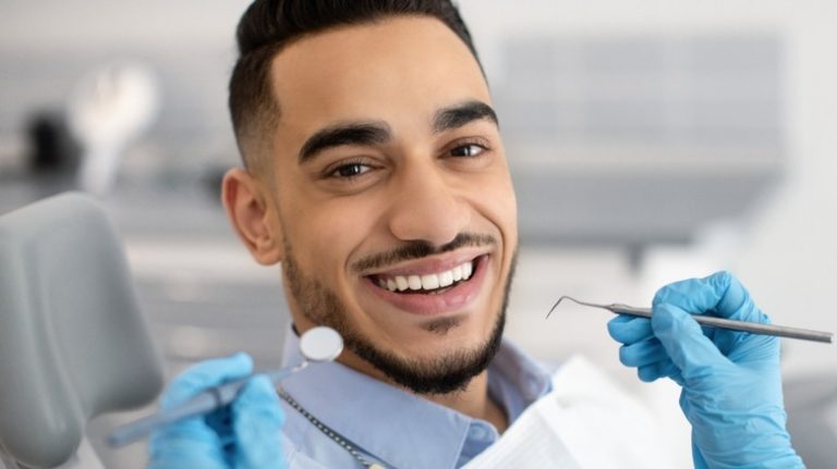 Young man in dentist chair