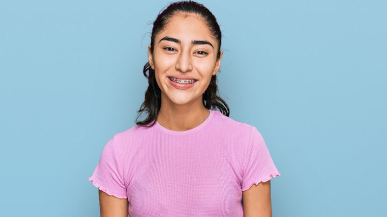 Girl smiling with braces