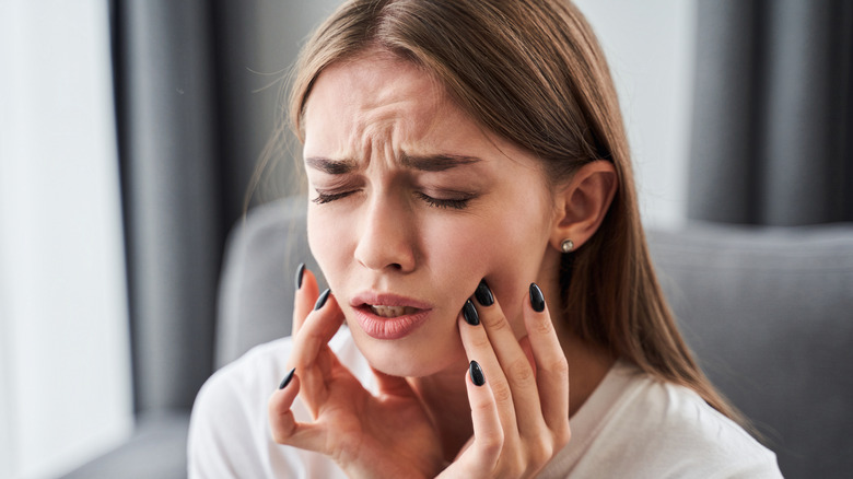 Girl with toothache