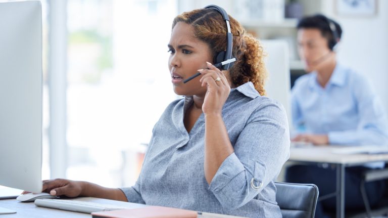 woman talking to someone on hotline