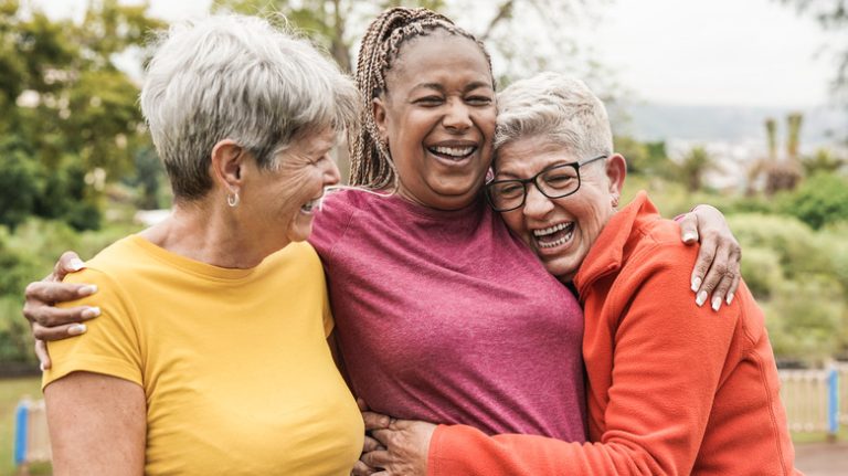 senior women laughing together