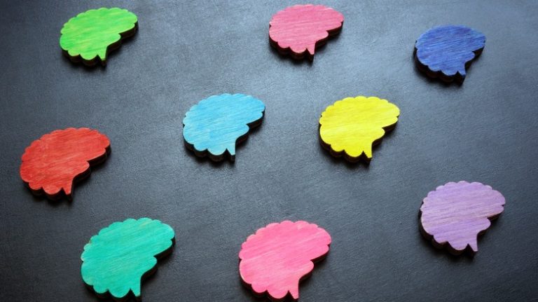 different colored brain tiles on table