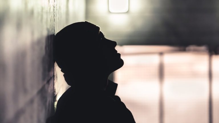 male silhouette hallway