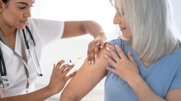 Woman getting a shot