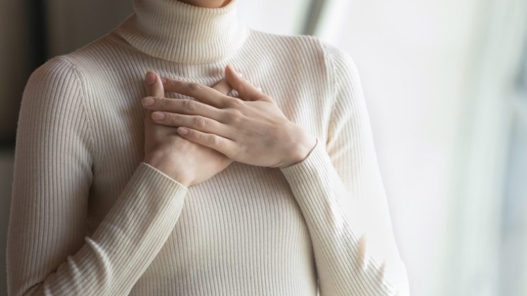 Woman making gesture of gratitude