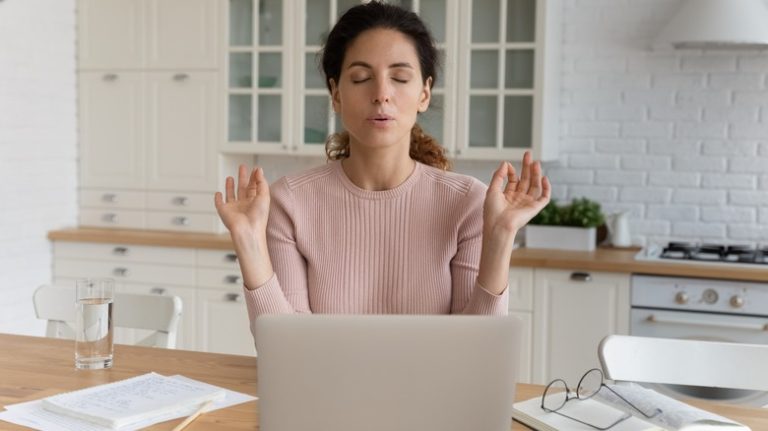 Woman stressed relaxing techniques computer