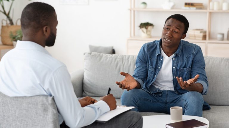 Patient and doctor in therapy session